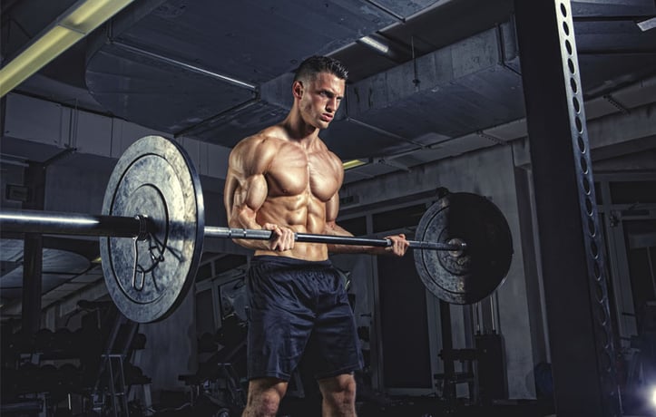 A man lifting weights in the gym