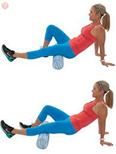 woman foam rolling