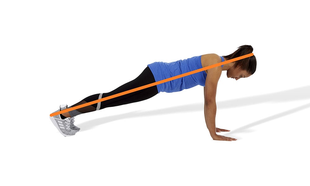 woman doing a proper form pushup