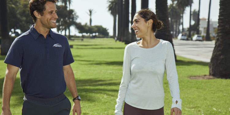 Trainers Walking In a Park