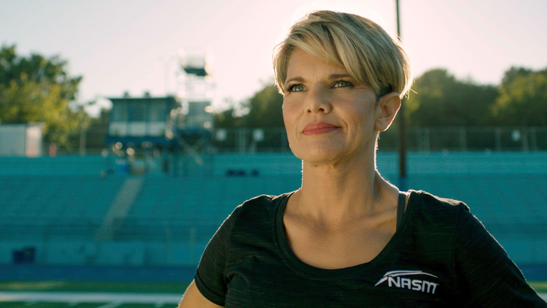Female NASM trainer posing for photo