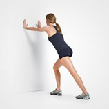 Woman doing a standing calf stretch