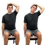 man doing a sitting trap stretch