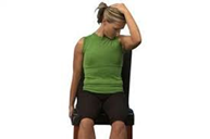 woman doing a sitting levator scapulae stretch