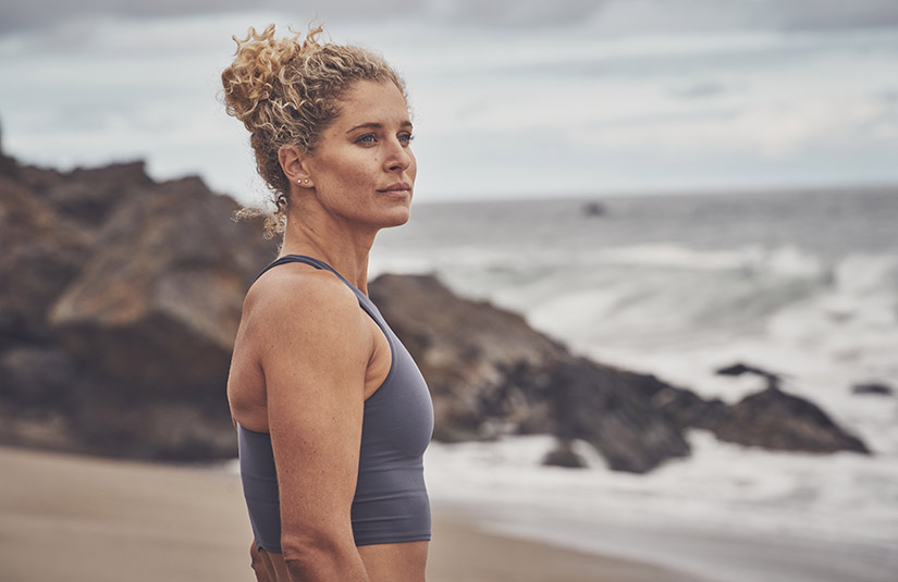 lindsey jacobellis on a beach looking in the distance