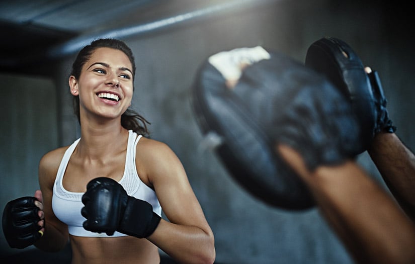 a woman boxing in the gym